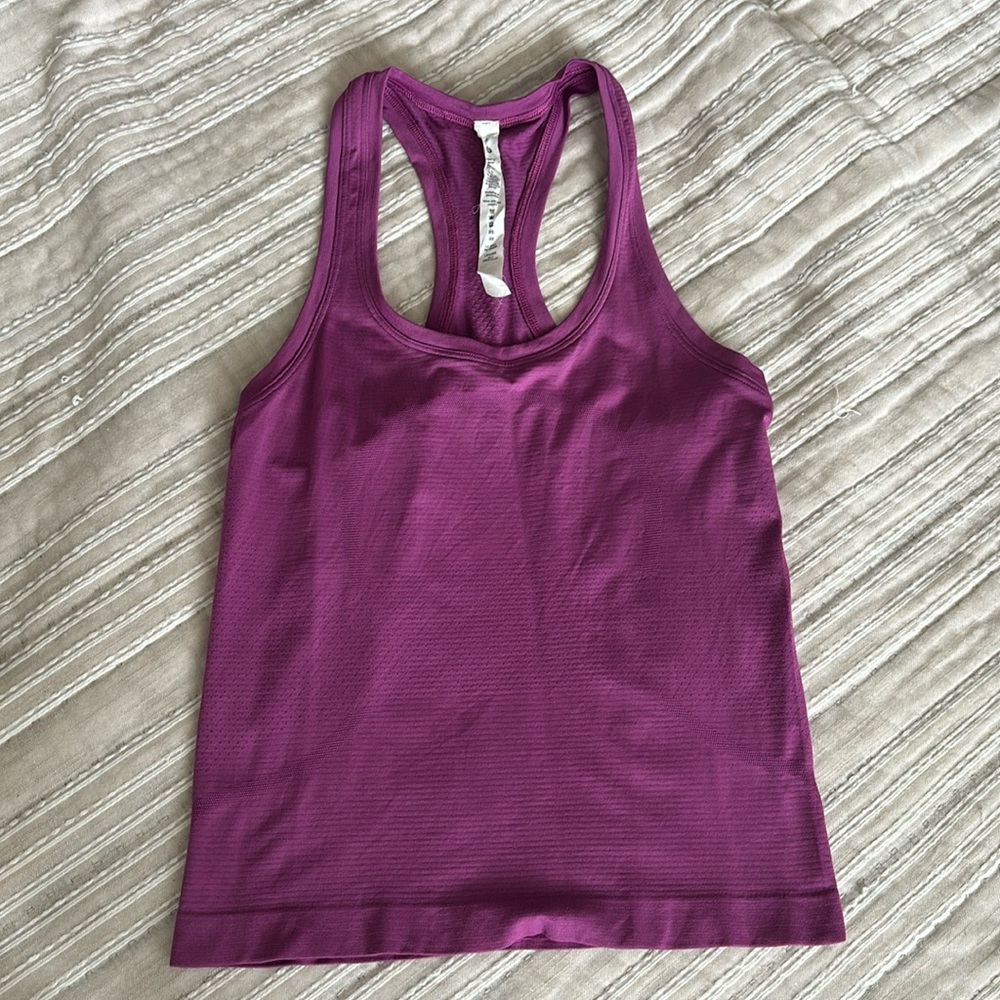 Like new…Lululemon swiftly race tank. Size 4. Bundle and save!